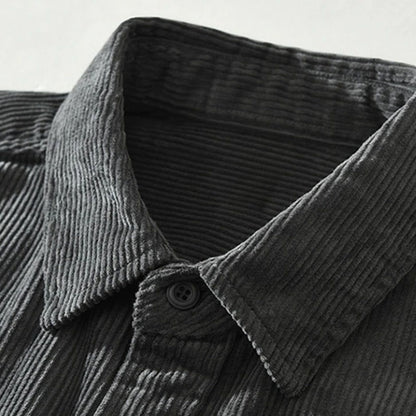Stylish men's abstract pattern long-sleeve shirt in a relaxed fit. Versatile button-up casual menswear.