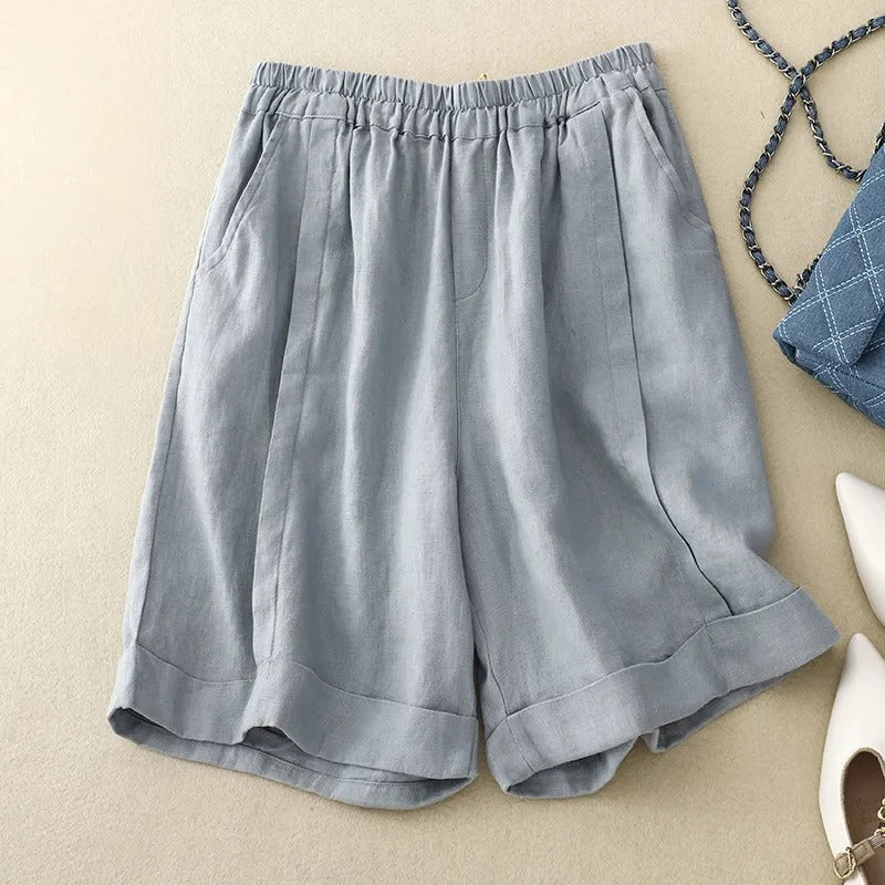 Men's relaxed fit blue summer shorts, comfortable & stylish for casual warm weather fashion.