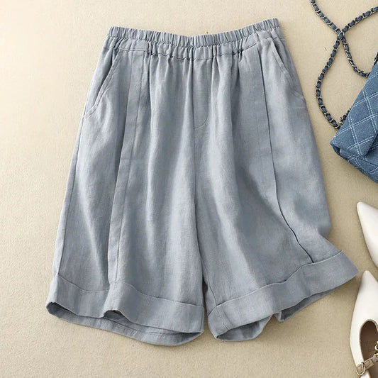 Men's relaxed fit blue summer shorts, comfortable & stylish for casual warm weather fashion.