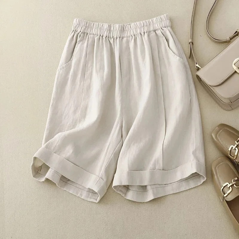 Cream relaxed fit men's shorts, ideal for a comfortable and stylish summer fashion look.