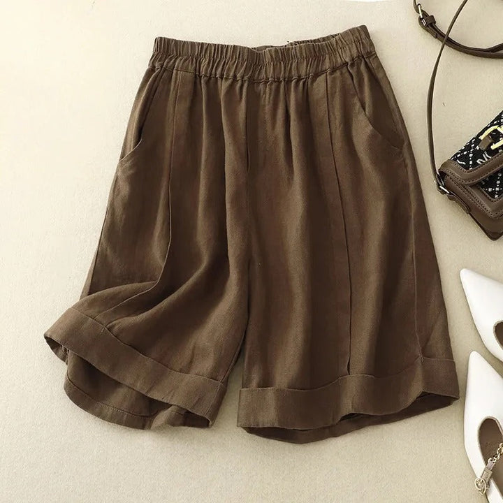 Brown tailored relaxed fit summer shorts for men, offering comfortable casual everyday wear.
