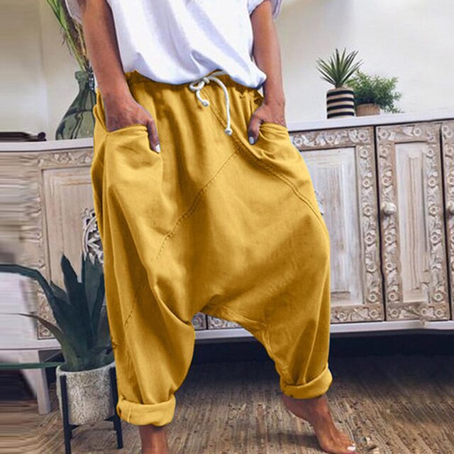 Men's relaxed fit bohemian harem pants in soft fabric, perfect for casual comfort & unique streetwear fashion.
