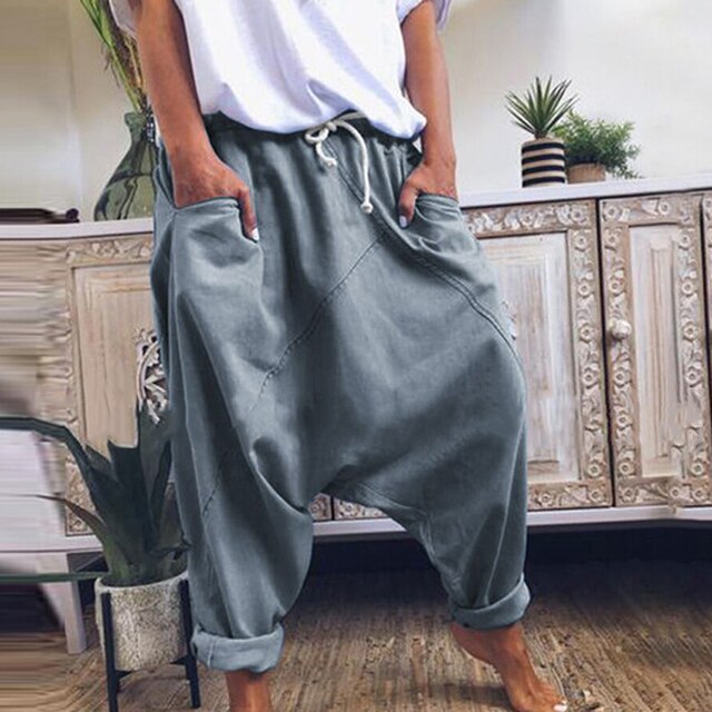 Loose fit men's bohemian harem pants, comfortable & versatile for casual wear or unique fashion statements.