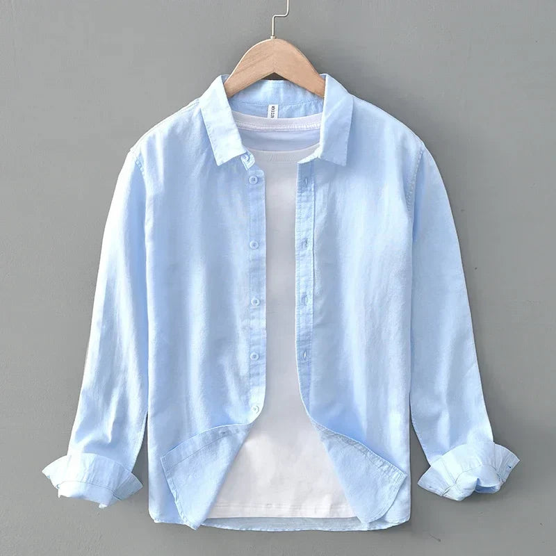 Versatile men's button-down shirt, a breathable essential for comfortable warm weather outfits.