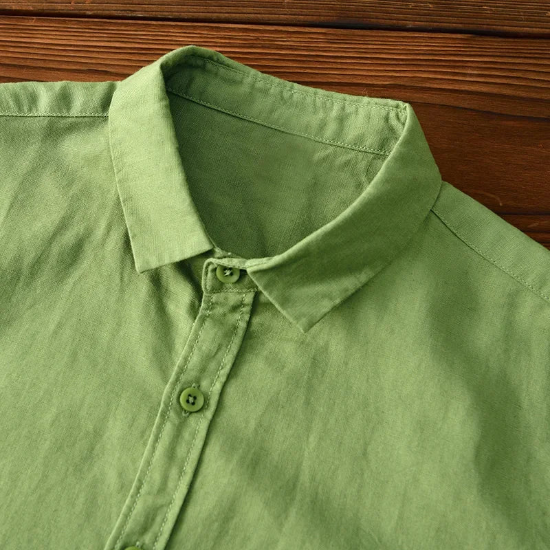 Relaxed fit men's shirt in white, a breathable essential for warm weather and versatile daily wear.