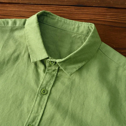 Relaxed fit men's shirt in white, a breathable essential for warm weather and versatile daily wear.