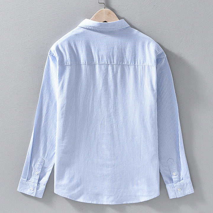Men's casual long sleeve button-down shirt in a relaxed fit. Ideal for versatile everyday spring and summer fashion.