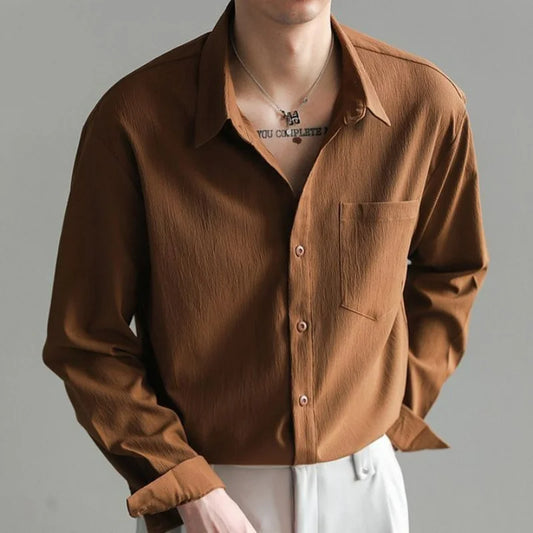 Men's relaxed fit button-up shirt for effortless style & comfort.