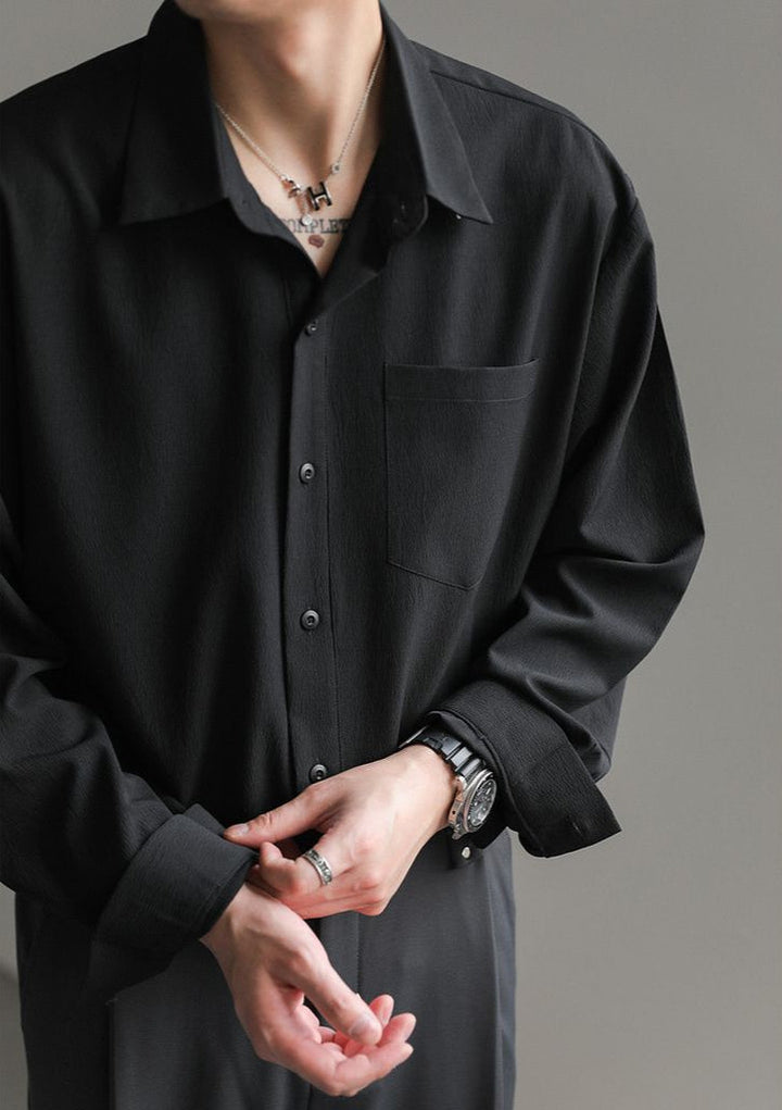 Back view of a comfortable men's relaxed fit button-up shirt, perfect for everyday men's fashion.