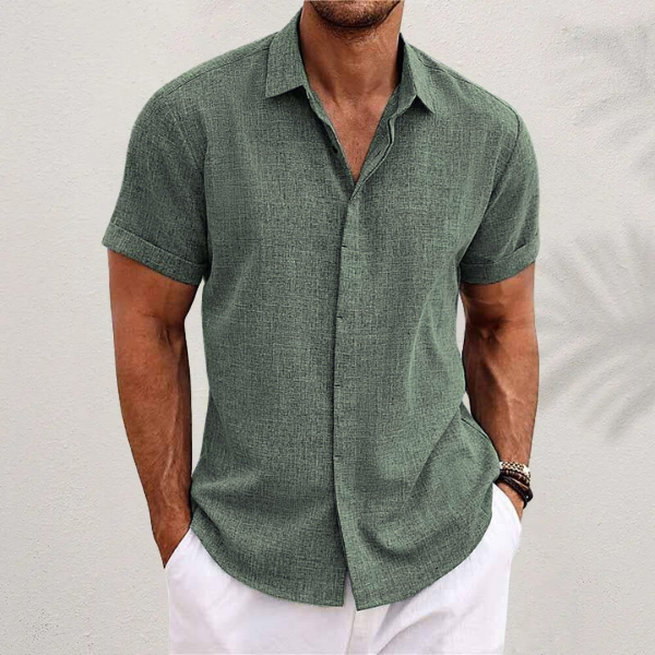 Men's relaxed fit button-up shirt with short sleeves and classic collar, perfect for casual warm-weather style.