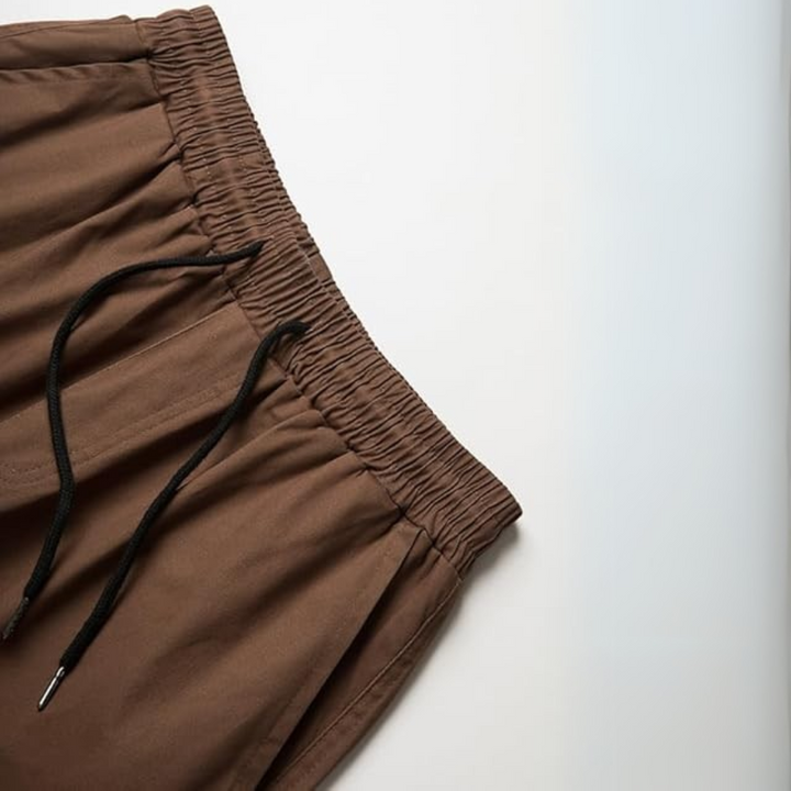 Close-up of cargo pocket on men's relaxed fit joggers, practical and stylish casual pants.