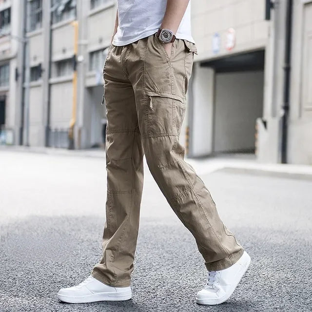 Men's relaxed fit cargo pants with multiple utility pockets, ideal for comfortable, functional everyday casual wear.