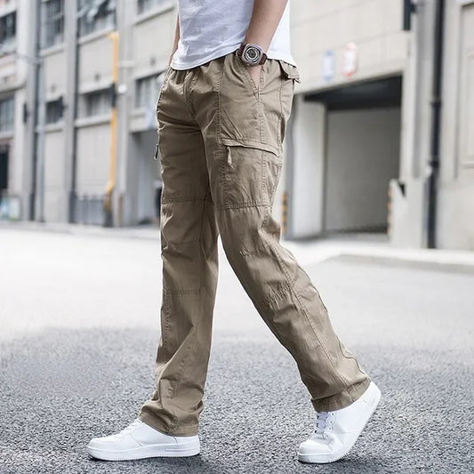 Men's relaxed fit cargo pants with multiple utility pockets, ideal for comfortable, functional everyday casual wear.