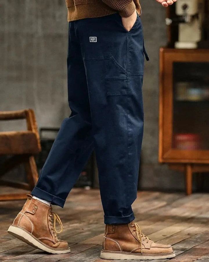 Khaki men's relaxed fit cargo pants, comfortable and durable, perfect for casual or outdoor wear.