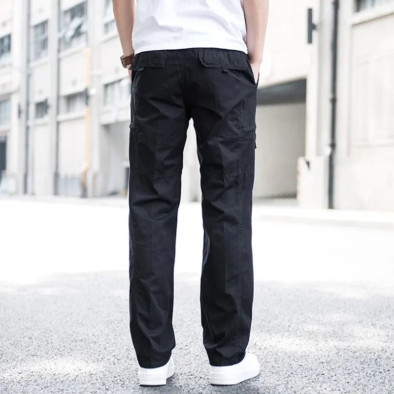 Black men's relaxed fit cargo pants, versatile multi-pocket utility design for casual and modern street style.
