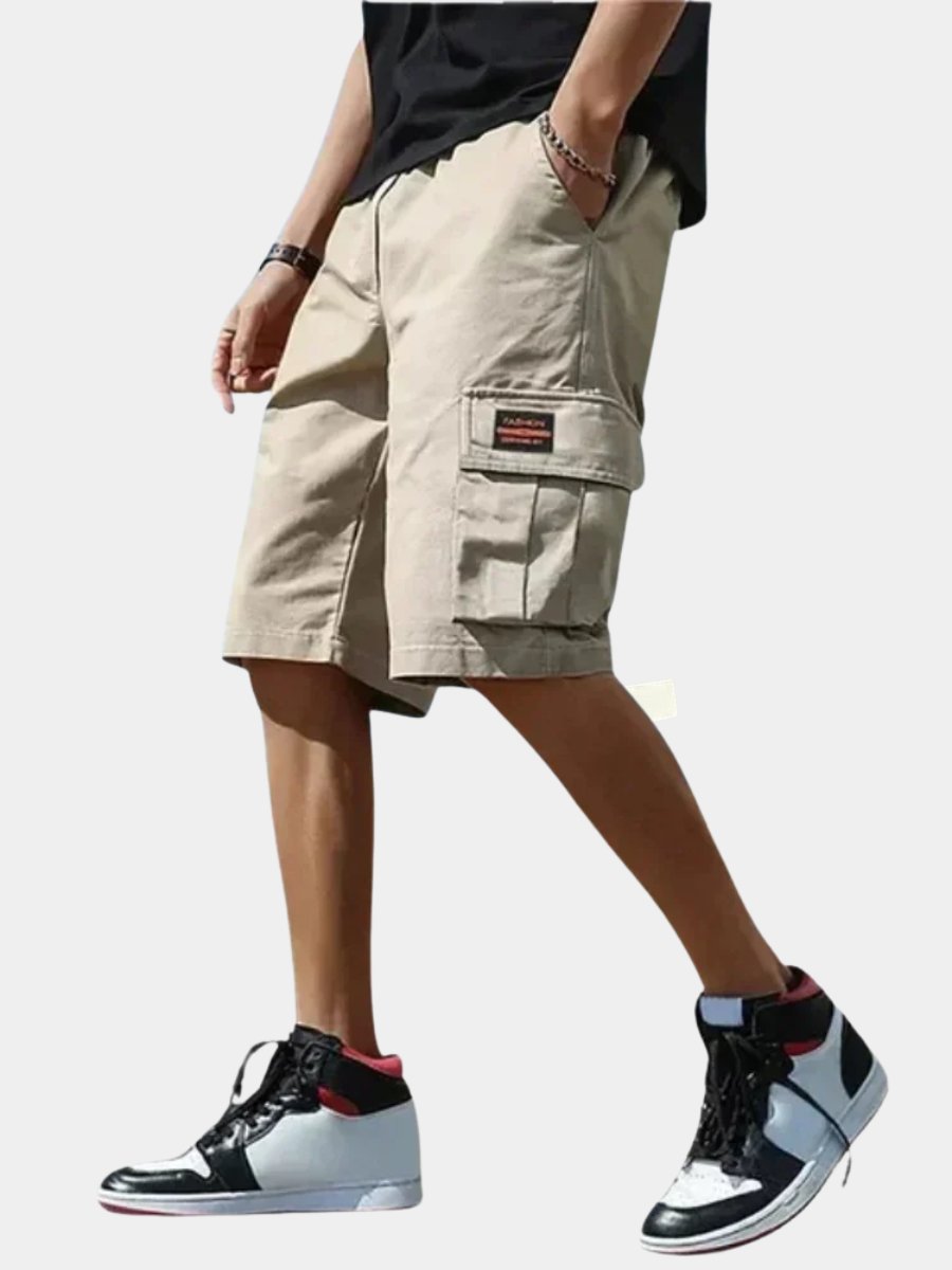 Men's relaxed fit cargo shorts in a neutral color, perfect for ultimate summer comfort & casual utility.