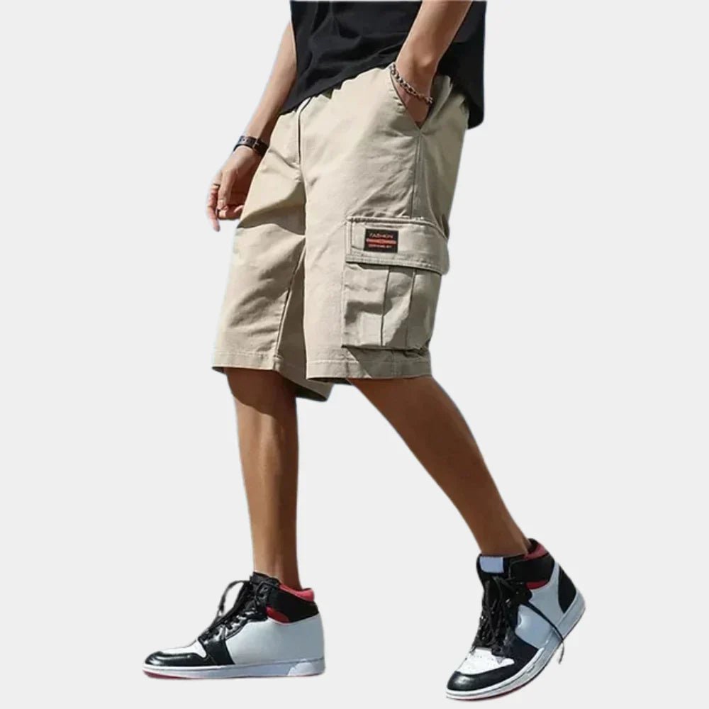 Durable men's cargo shorts with multiple pockets, ideal for outdoor adventures, travel & everyday utility.