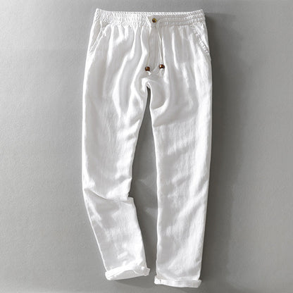 Stylish men's relaxed fit casual pants, versatile for summer fashion. Breathable fabric, easy wear.