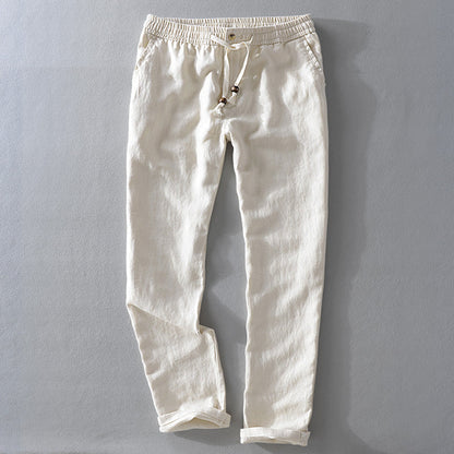 Comfortable men's relaxed fit pants with adjustable drawstring, perfect for breathable summer casual style.