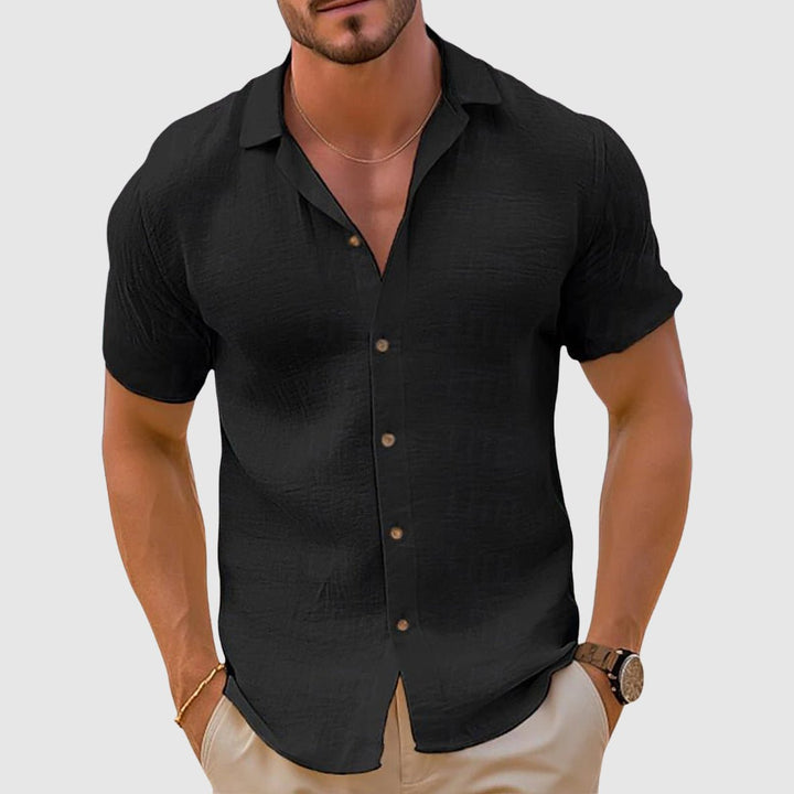 Comfortable men's relaxed casual shirt with short sleeves, great for warm weather travel.