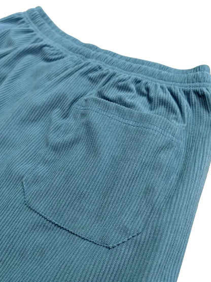 Versatile men's relaxed fit casual trousers in grey, ideal for everyday style and comfort.