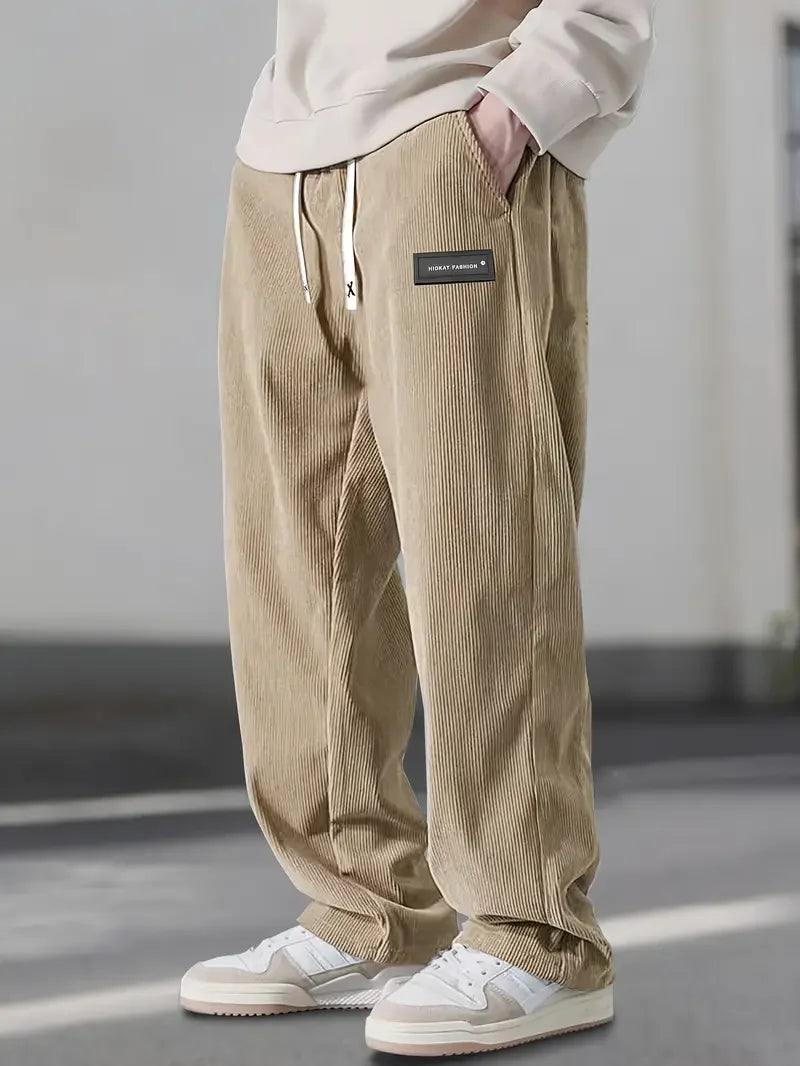 Relaxed fit beige men's trousers, straight leg design for ultimate comfort and daily wear.
