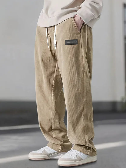 Relaxed fit beige men's trousers, straight leg design for ultimate comfort and daily wear.
