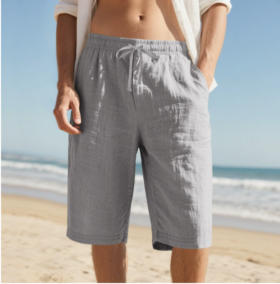 Comfortable men's relaxed fit chino shorts featuring a drawstring waist for ultimate casual summer wear.