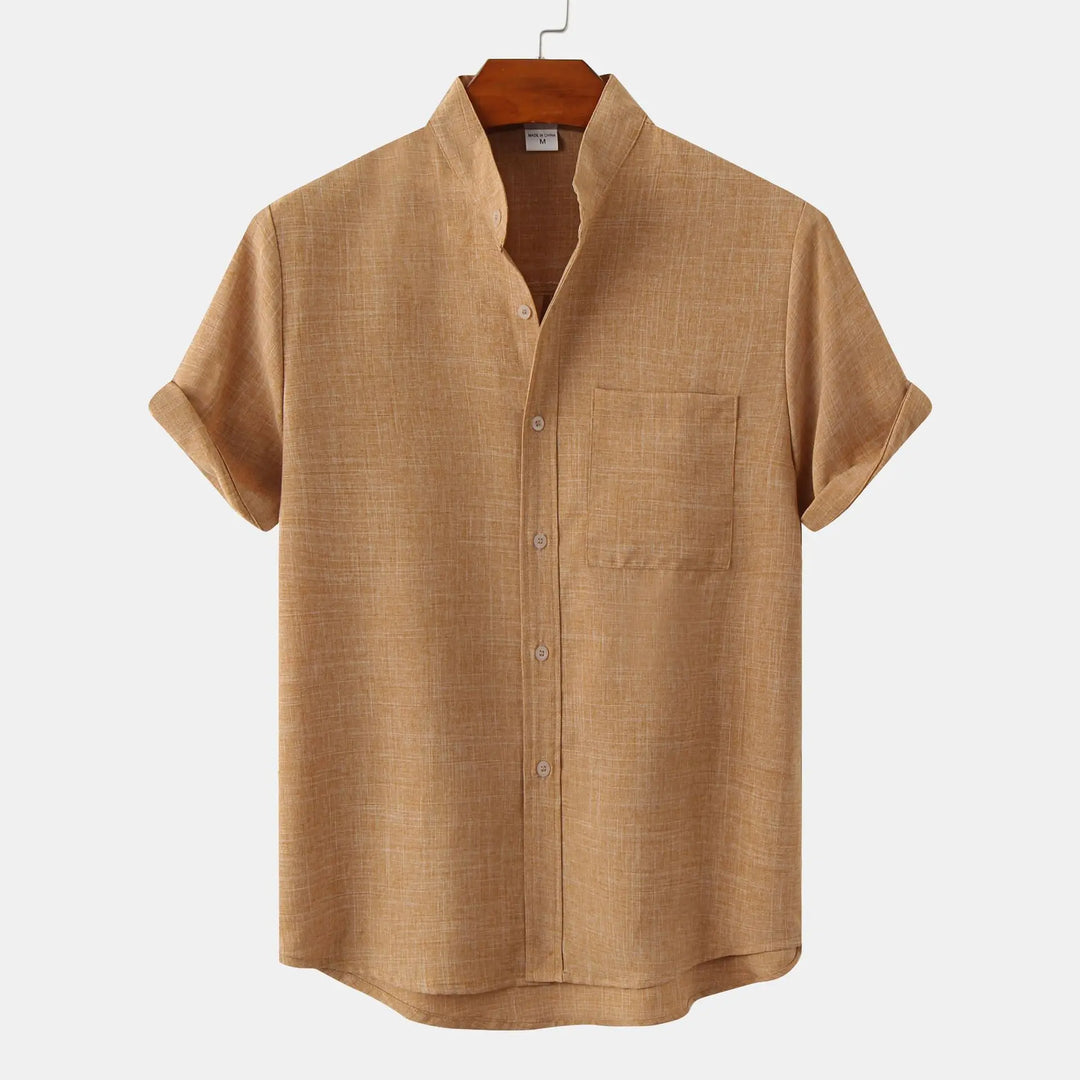 Men's short sleeve collarless shirt with a button-up front, offering a relaxed fit for comfortable summer style.