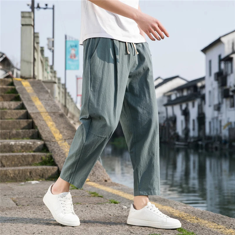 Men's relaxed fit pants offering effortless style & comfort. Versatile for casual to semi-formal occasions.