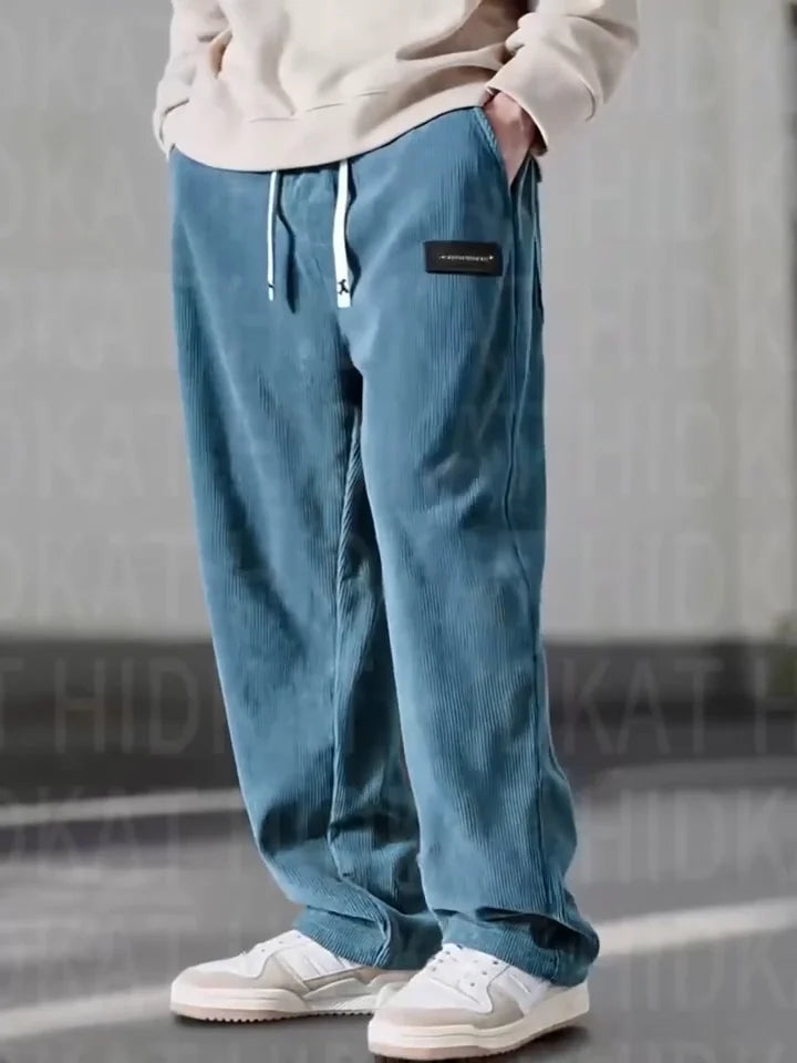 Comfortable men's corduroy cargo trousers. Relaxed fit design with practical multi-pockets.