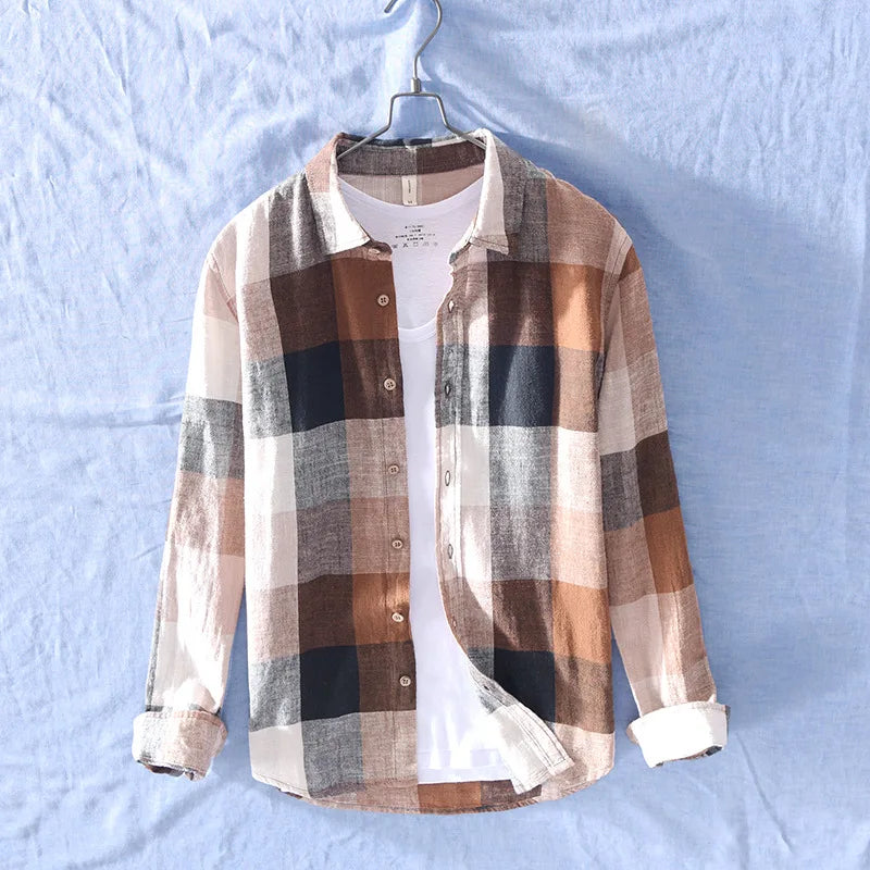 Casual men's long-sleeve cotton-linen button-up shirt with a relaxed fit, ideal for warm weather fashion.
