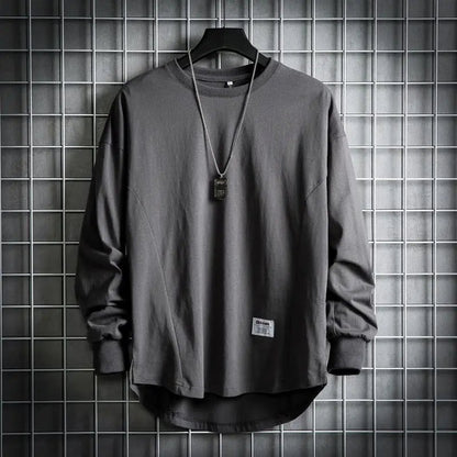 Men's relaxed fit crewneck pullover with drop hem. Soft, comfortable long sleeve for casual everyday wear.