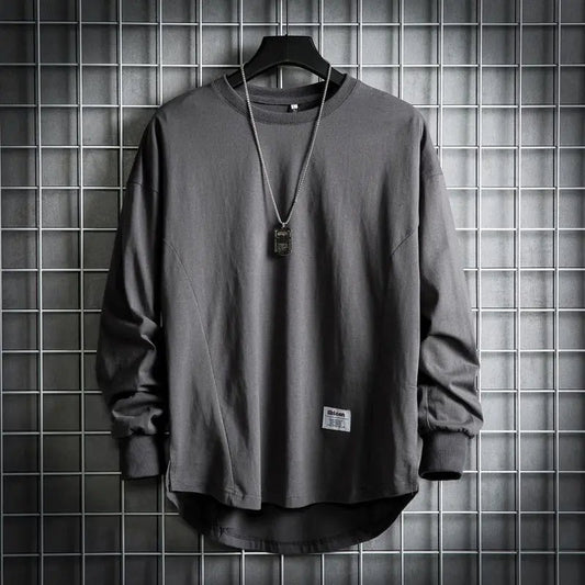Men's relaxed fit crewneck pullover with drop hem. Soft, comfortable long sleeve for casual everyday wear.