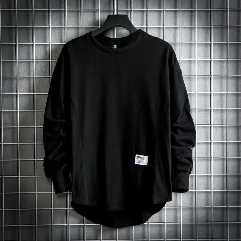 Comfortable men's oversized pullover featuring a stylish drop hem and classic crewneck design.
