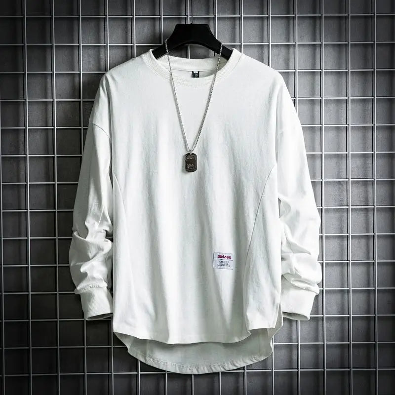 Relaxed fit men's drop hem pullover, perfect long sleeve crewneck for comfortable casual wear and layering.