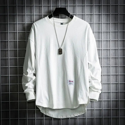 Relaxed fit men's drop hem pullover, perfect long sleeve crewneck for comfortable casual wear and layering.