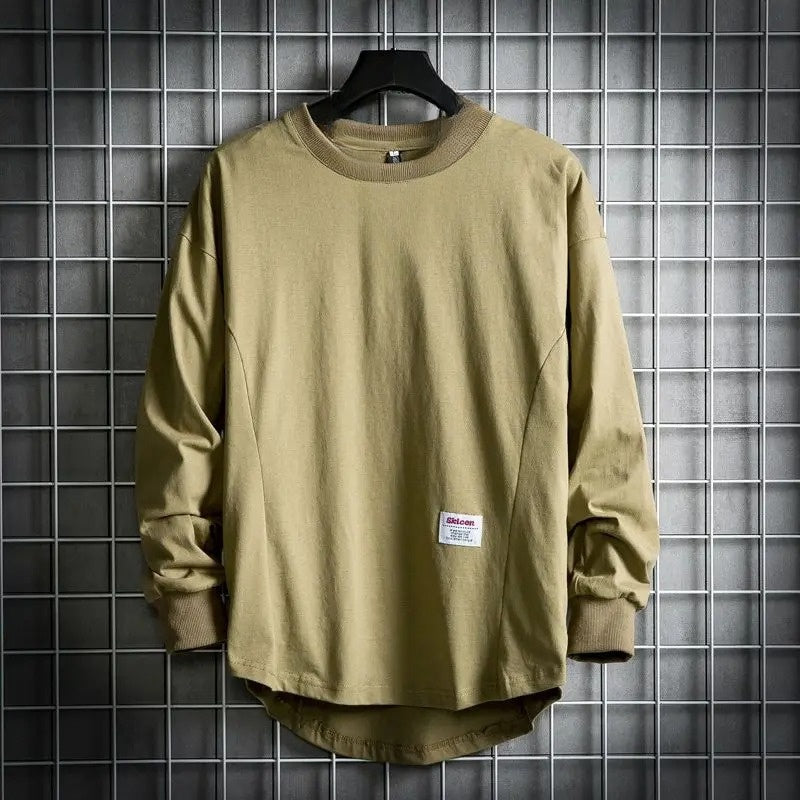 Versatile men's drop hem pullover. Long sleeve, relaxed fit crewneck shirt for everyday comfort & style.