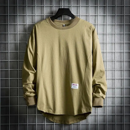 Versatile men's drop hem pullover. Long sleeve, relaxed fit crewneck shirt for everyday comfort & style.