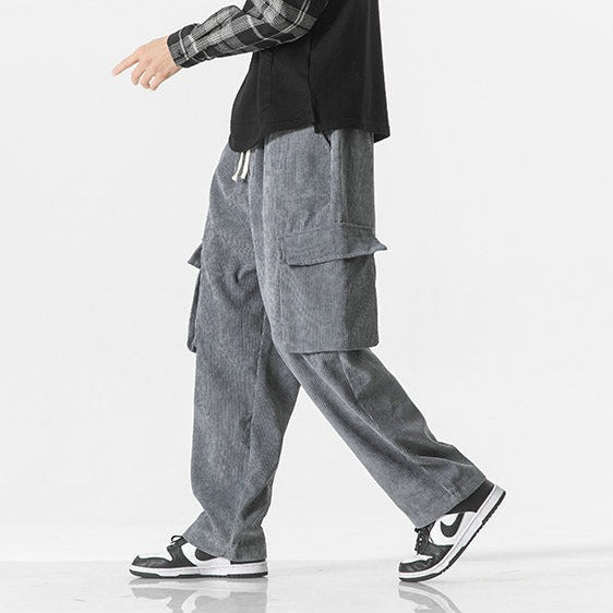 Men's casual dark blue cargo pants with a drawstring waist, perfect for a relaxed look.