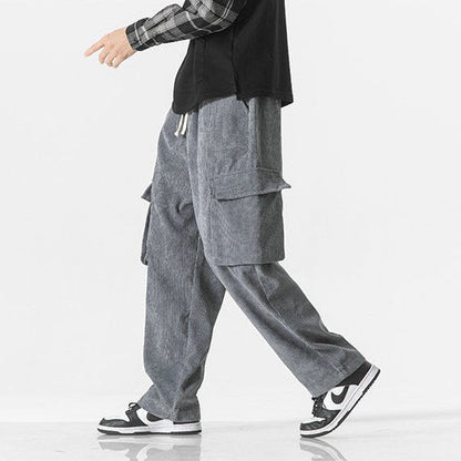 Men's casual dark blue cargo pants with a drawstring waist, perfect for a relaxed look.
