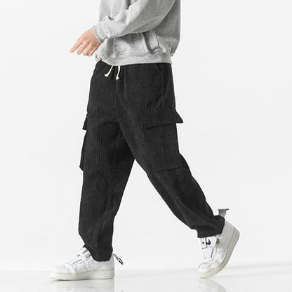 Men's dark grey drawstring cargo pants, a comfortable bottom for casual men's fashion.