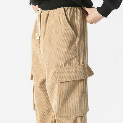 Drawstring cargo pants for men in dark blue, offering a comfortable relaxed fit for casual wear.