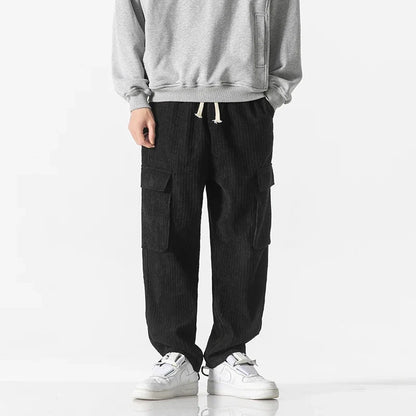 Black men's cargo pants with a drawstring waist, perfect for comfortable casual wear.