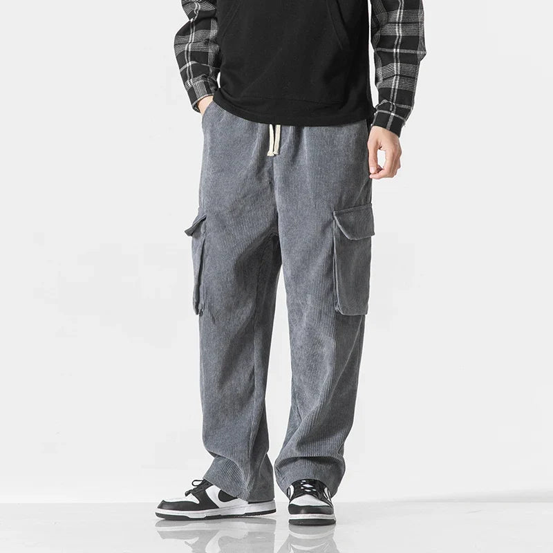 Comfortable men's drawstring cargo pants in a relaxed fit, available in multiple colors.