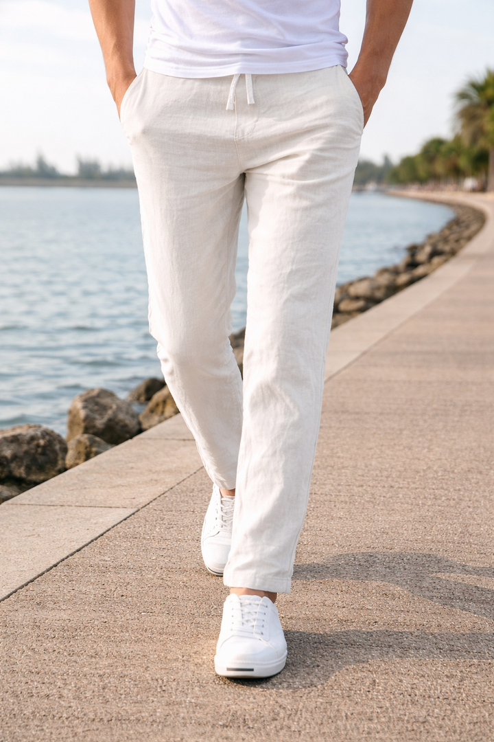 Men's comfortable relaxed fit drawstring trousers. Easy-wear straight leg pants with elastic waist for daily style.