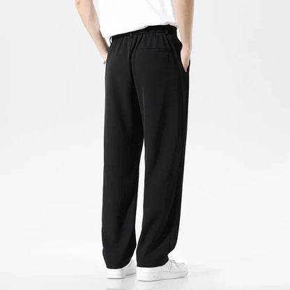 Comfortable men's relaxed fit business pants, ideal for workwear and versatile casual styling.