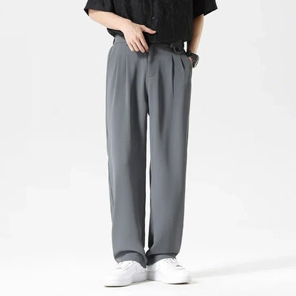 Wrinkle-resistant men's dress pants, relaxed fit for all-day comfort in formal & casual settings.