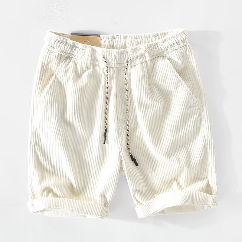 Green men's everyday comfort shorts, relaxed fit for summer & travel.