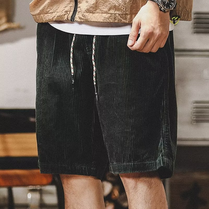 Men's relaxed fit comfort shorts featuring deep pockets & an adjustable drawstring, great for casual wear.